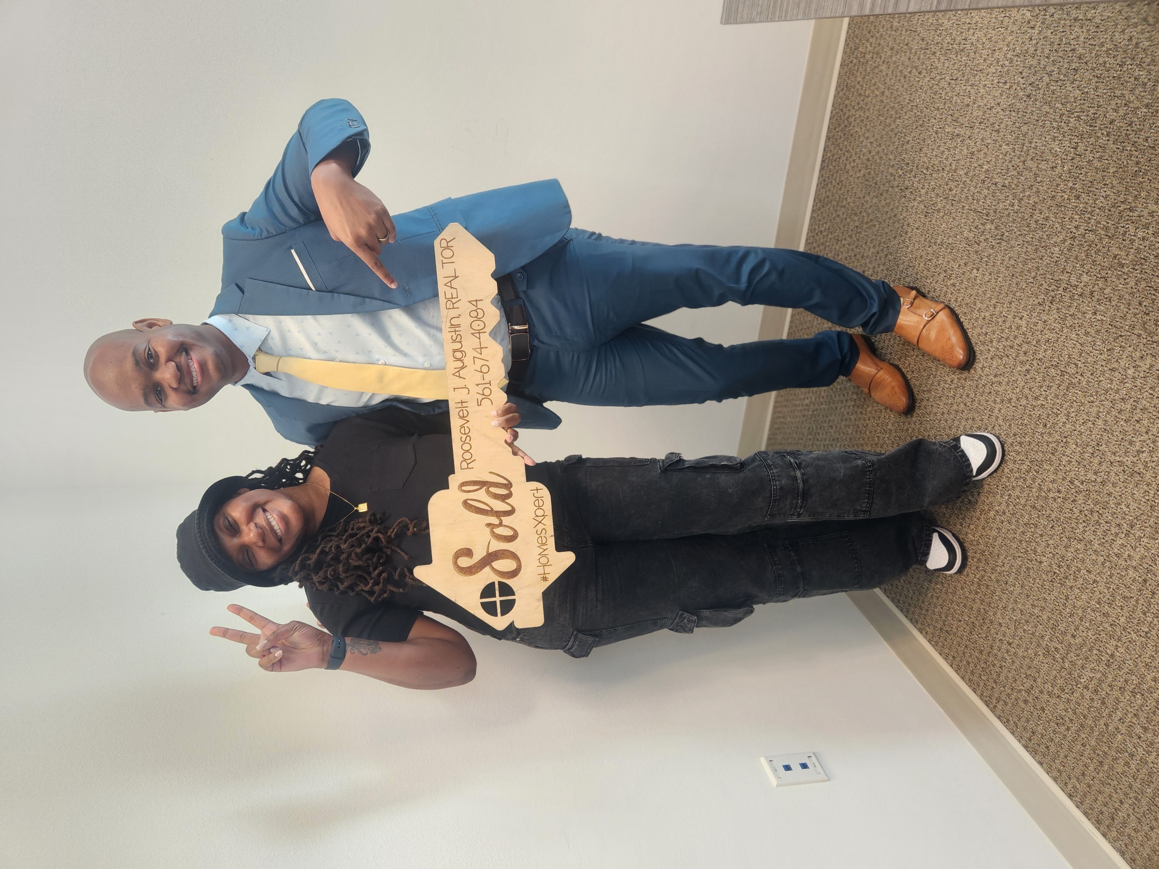 Roosevelt with new homeowners